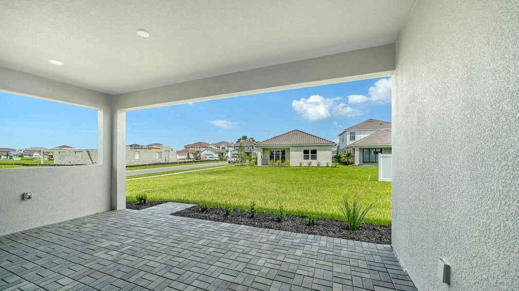 Exterior details and patio area of a home in Windward Real Estate and Homes for Sale in Sarasota, FL - Neal Communities, Lakewood Ranch (Image 29).