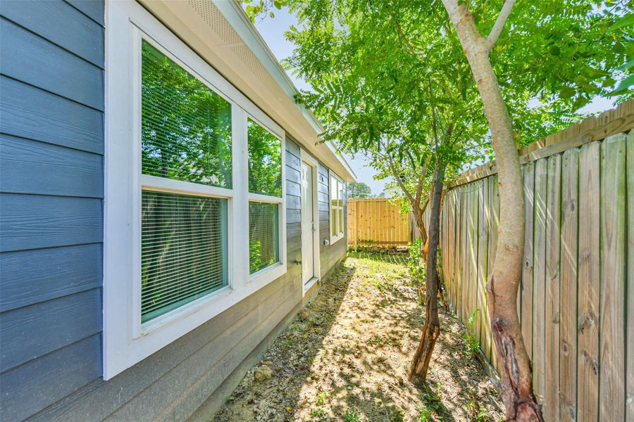 Exterior details and patio area of a home in , Houston (Image 13). Exterior details and patio area of a home in , Houston (Image 13).
