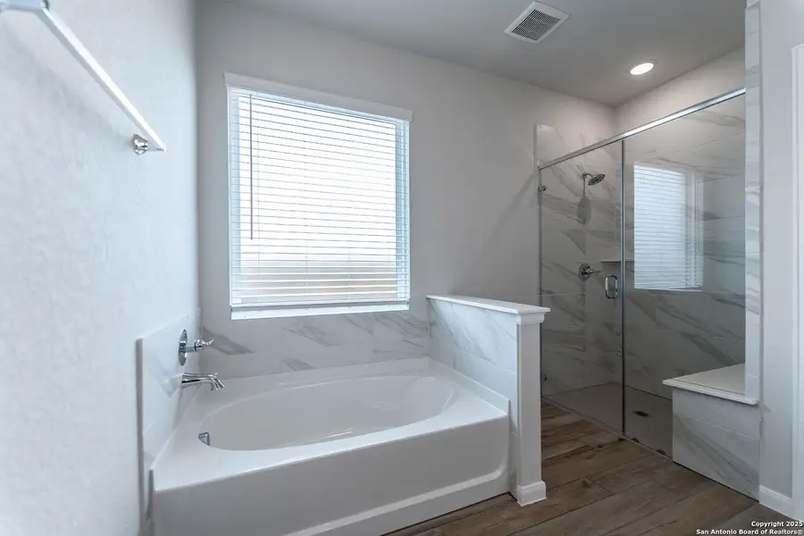 Furnished interior view inside a new home in The Woodlands at Medina Hills, Mico (Image 5).