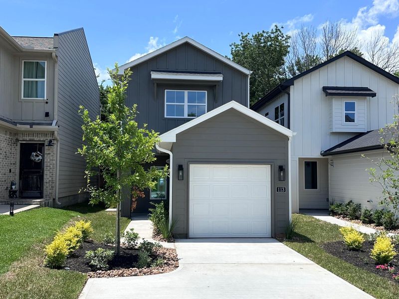 Front exterior of a new home in , Montgomery, TX, highlighting curb appeal (Image 4).