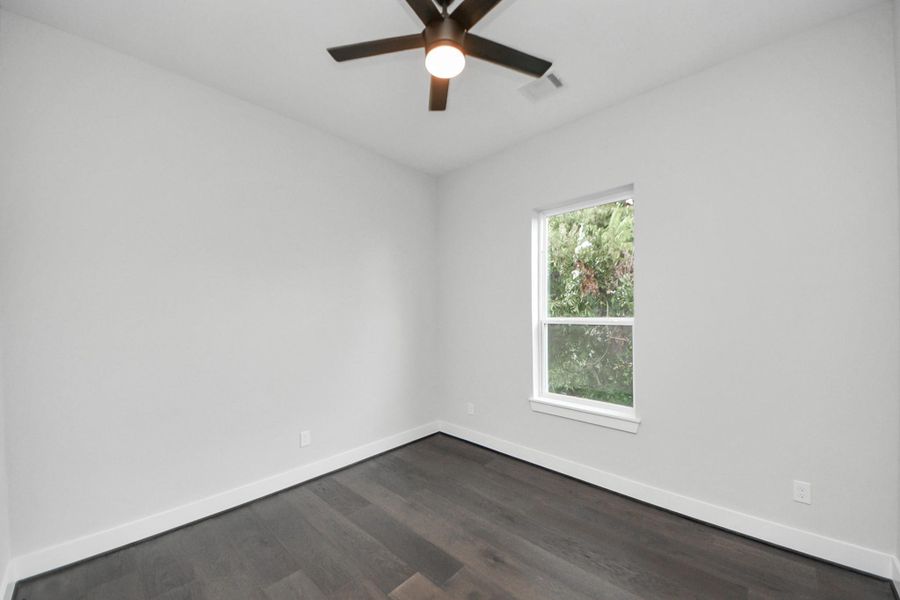 Secondary bedroom with natural light and versatile layout