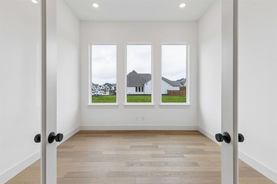 The professional working from home will appreciate this light filled, private home office.