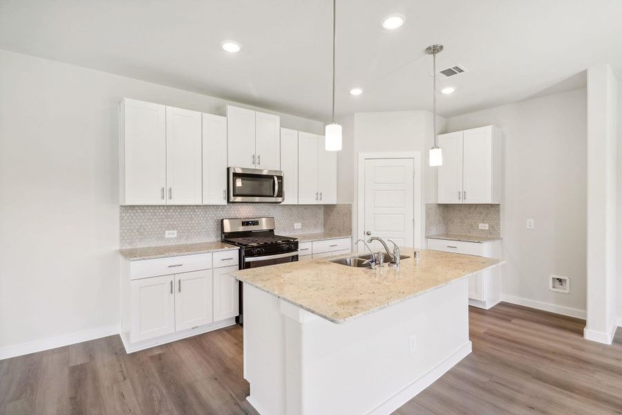 Photo is not of the actual home, but is an inspirational photo of builder’s model home and may depict options, furnishings, and/or decorator features that are not included Photo is not of the actual home, but is an inspirational photo of builder’s model home and may depict options, furnishings, and/or decorator features that are not included