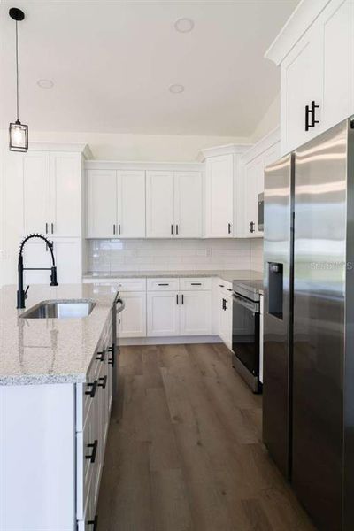 Furnished interior view inside a new home in , North Port (Image 14).