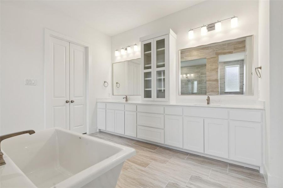 No shortage to style or space in this over the top owner's bath!