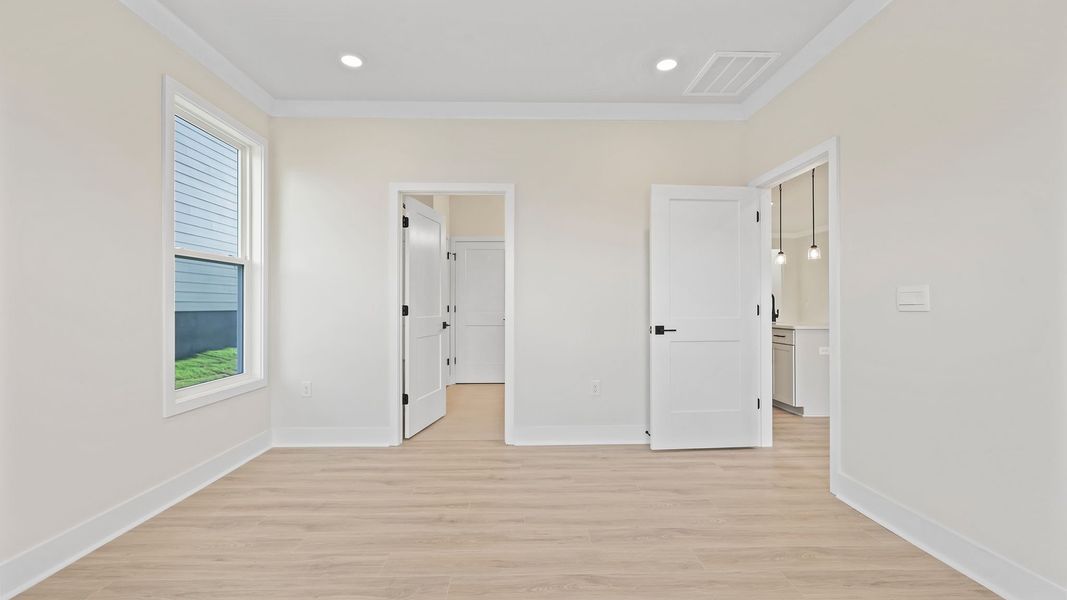 Spacious, unfurnished interior of a new home in Adams Glen, Greenville (Image 29).