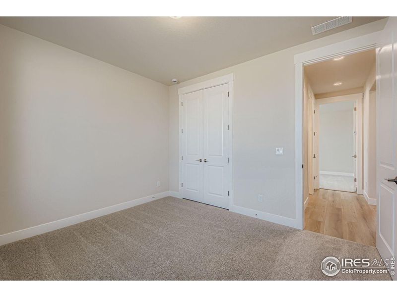 Spacious, unfurnished interior of a new home in RainDance National 60/70, Windsor (Image 24).