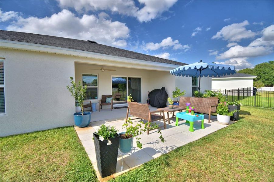 Exterior details and patio area of a home in Harmony at Lake Eloise, Winter Haven (Image 29).
