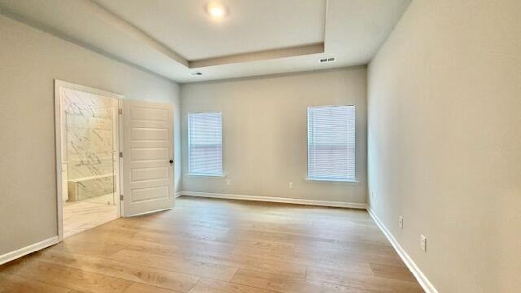 Spacious, unfurnished interior of a new home in Horizons at Summers Corner | 55+, Summerville (Image 15).