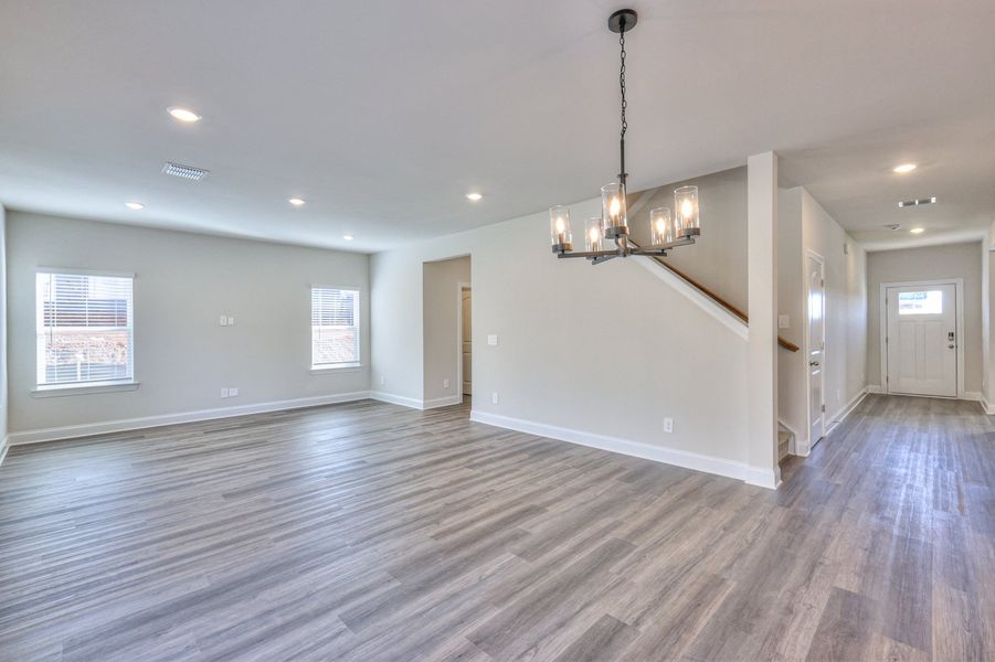 The open-concept floorplan allows for an easy flow between the kitchen and dining areas.