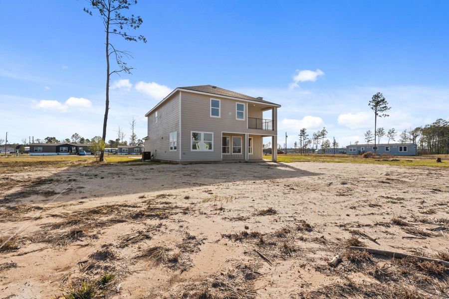 Exterior details and patio area of a home in , Conroe (Image 27).