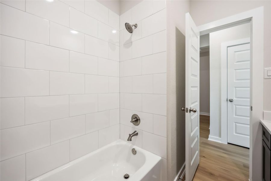 Furnished interior view inside a new home in Deer Pines, Conroe (Image 6).