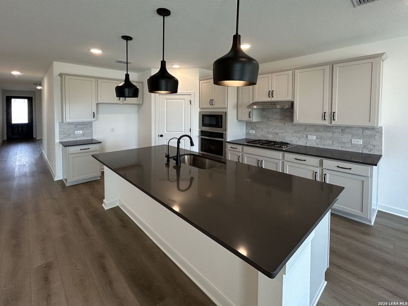 Furnished interior view inside a new home in Hennersby Hollow, San Antonio (Image 10).