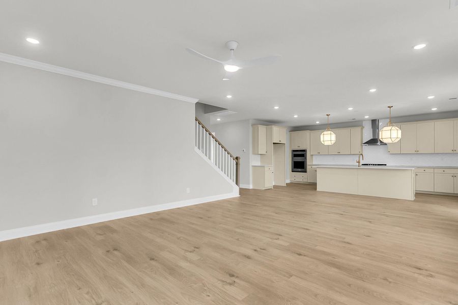 Spacious, unfurnished interior of a new home in Tidewater at Lakes of Cane Bay, Summerville (Image 40).