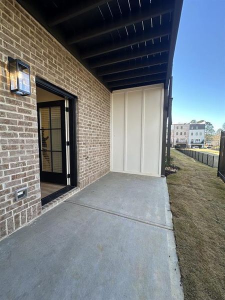Exterior details and patio area of a home in Skyview On Broad, Sugar Hill (Image 2). Exterior details and patio area of a home in Skyview On Broad, Sugar Hill (Image 2).