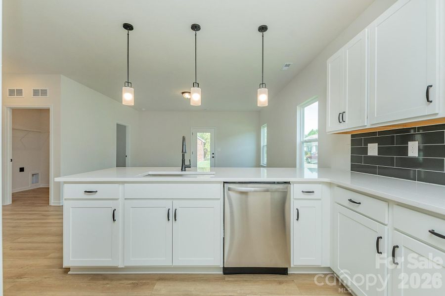 Furnished interior view inside a new home in Country Club Village, Salisbury (Image 6).