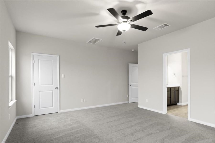 Representative unfurnished interior of a home built from the Ford by Pacesetter Homes in Village at Manor Commons, Manor (Image 12).