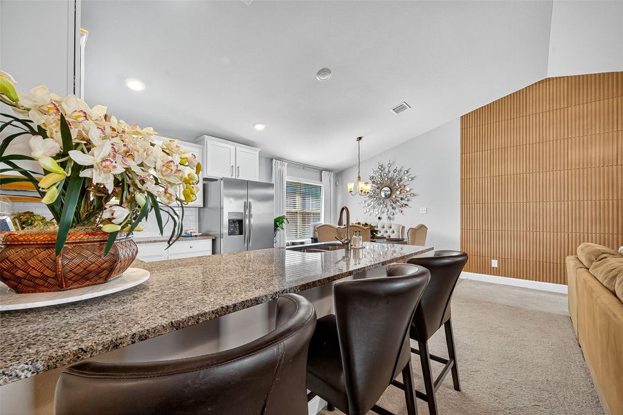 Furnished interior view inside a new home in Sunterra, Katy (Image 33).
