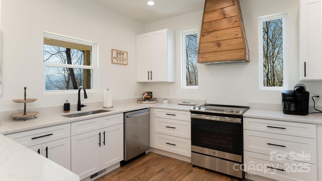 Furnished interior view inside a new home in , Waynesville (Image 3).