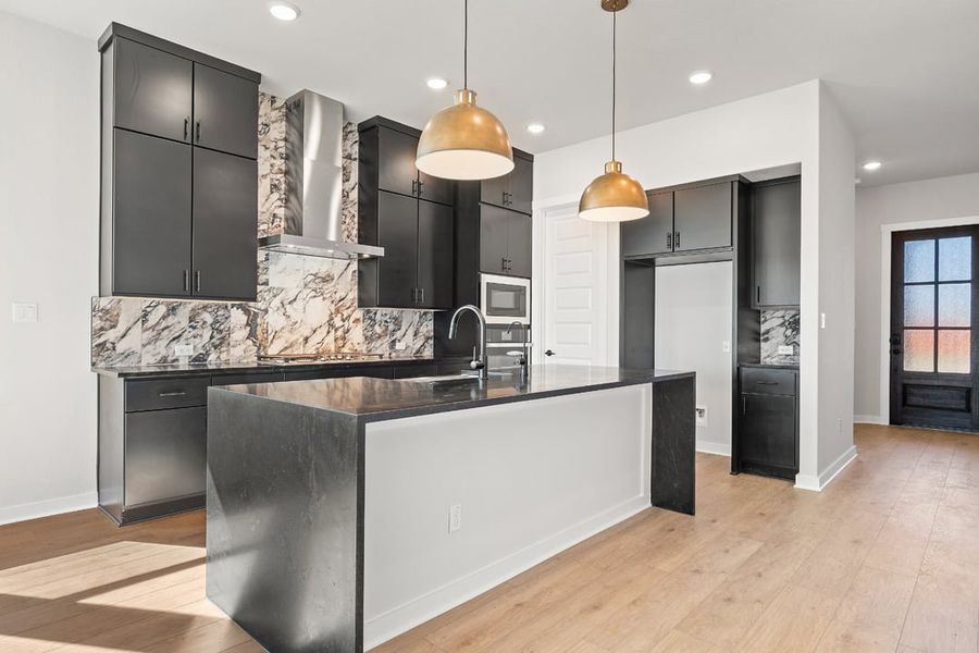 Furnished interior view inside a new home in Arbor Collection at Lariat, Liberty Hill (Image 9). Furnished interior view inside a new home in Arbor Collection at Lariat, Liberty Hill (Image 9).