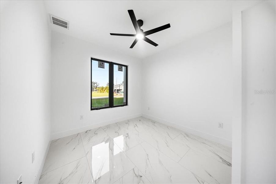 Spacious, unfurnished interior of a new home in , Punta Gorda (Image 26).
