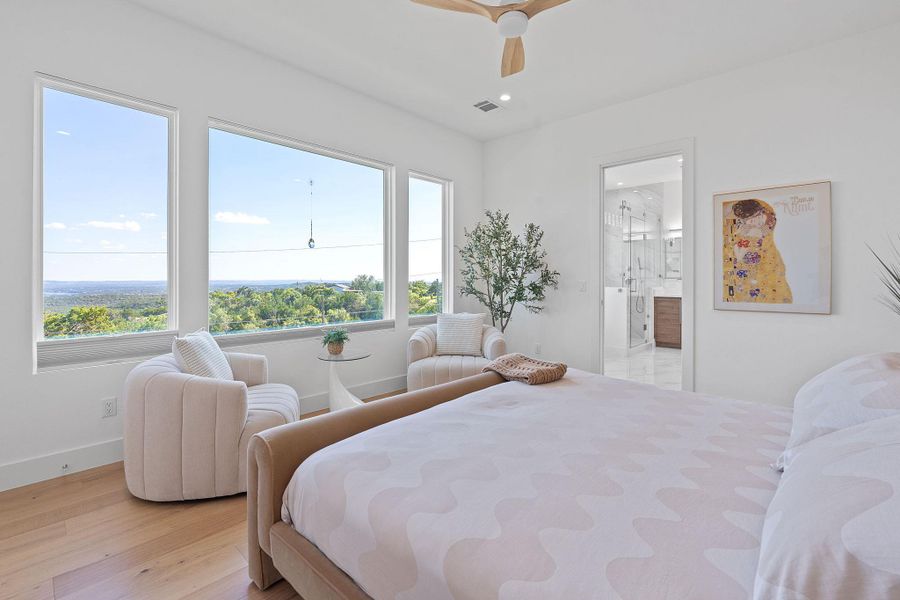 Wake up to Lake Travis and Hill Country views, right from your primary suite. Twinkling panaramic city lights at night. Wake up to Lake Travis and Hill Country views, right from your primary suite. Twinkling panaramic city lights at night.