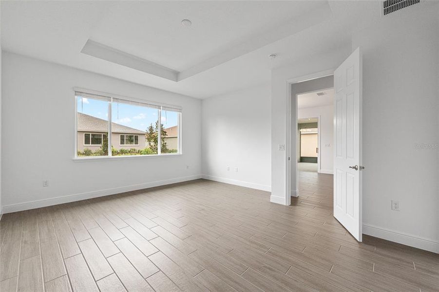 Spacious, unfurnished interior of a new home in On Top of the World Communities, Ocala (Image 27).