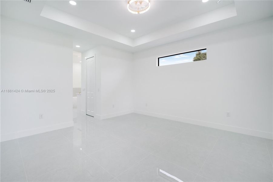 Spacious, unfurnished interior of a new home in , Port Charlotte (Image 27).