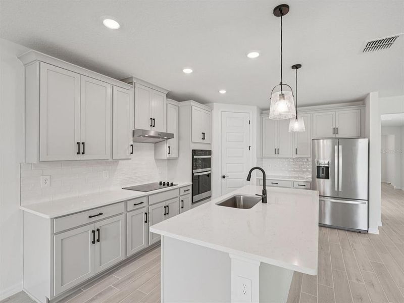 Furnished interior view inside a new home in Oakfield Trails - Signature Series, Parrish (Image 9). Furnished interior view inside a new home in Oakfield Trails - Signature Series, Parrish (Image 9).