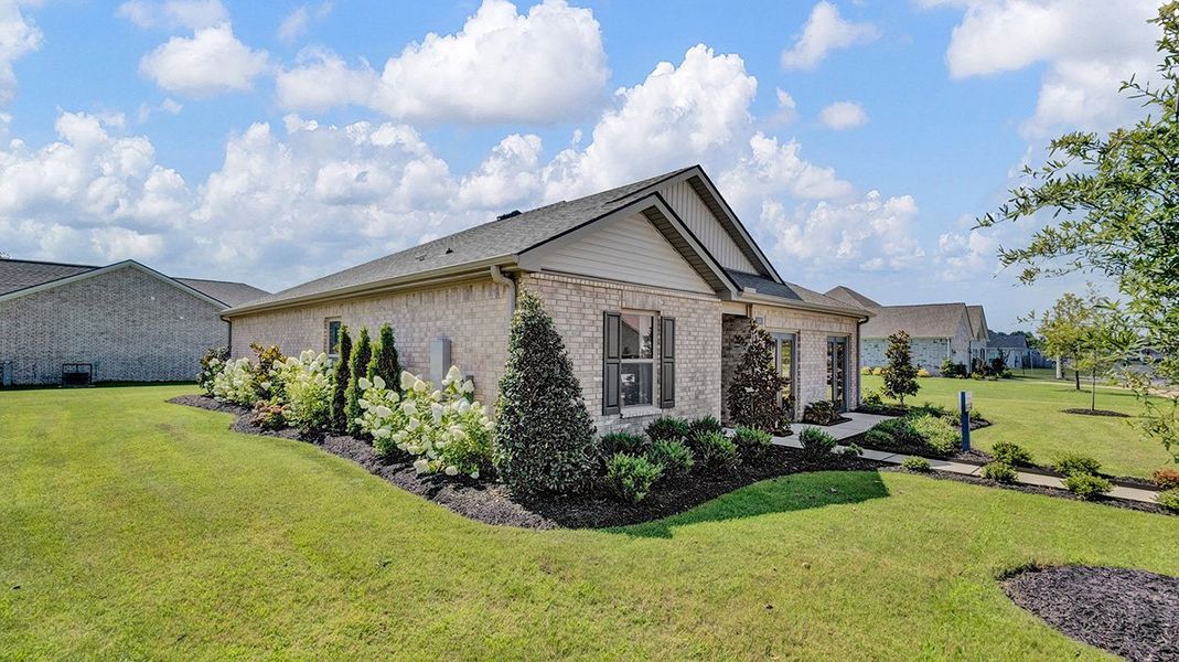 Front exterior of a new home in Huntington Estates, Millington, TN, highlighting curb appeal (Image 22).