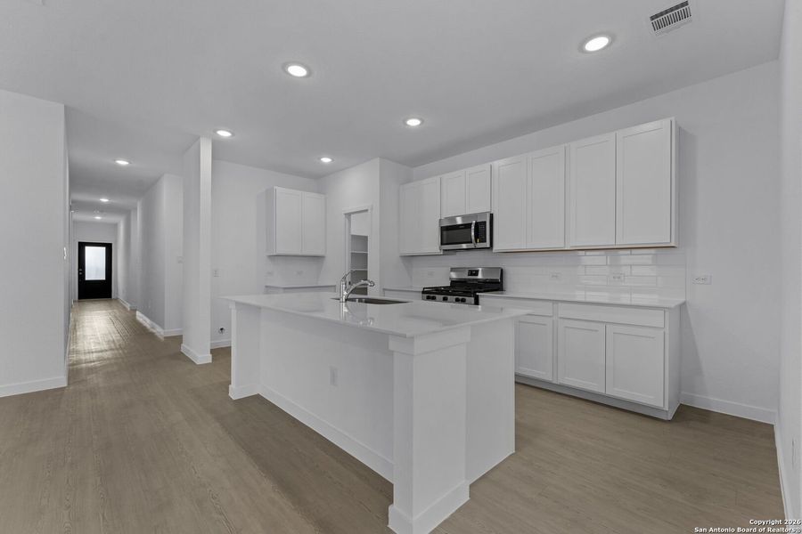 Furnished interior view inside a new home in , New Braunfels (Image 6).