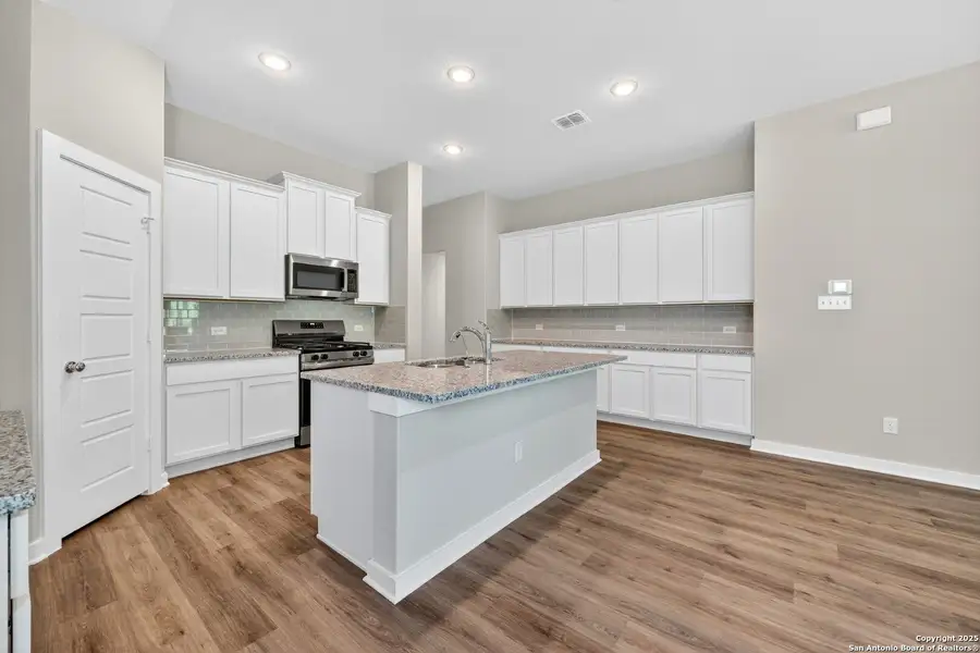 Furnished interior view inside a new home in Winding Brook, San Antonio (Image 7).