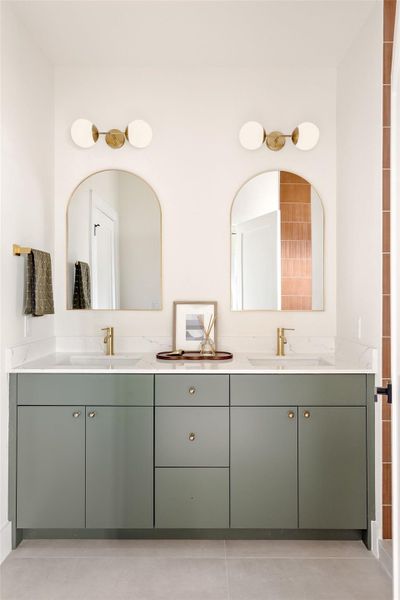 Bathroom featuring double vanity Bathroom featuring double vanity