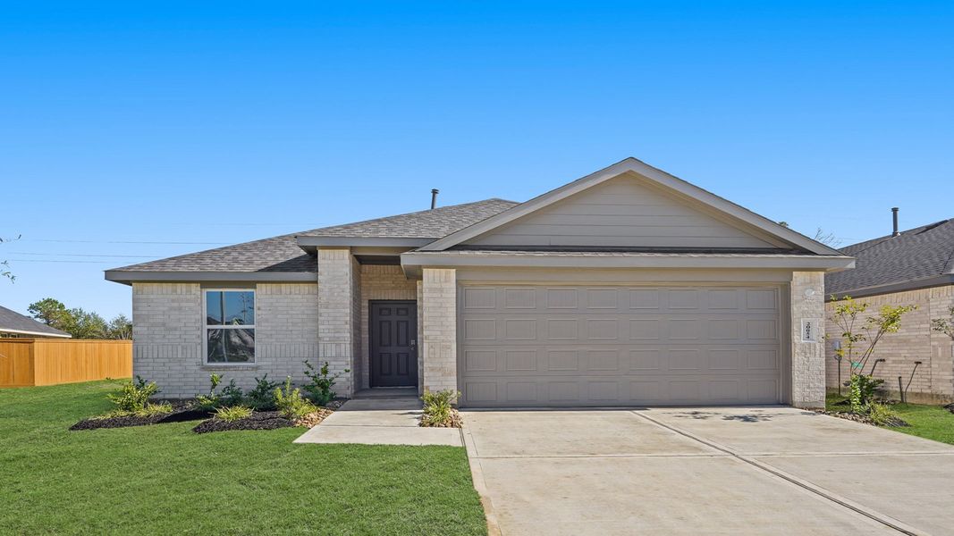 Front exterior of a new home in Cypress Green, Hockley, TX, highlighting curb appeal (Image 1).
