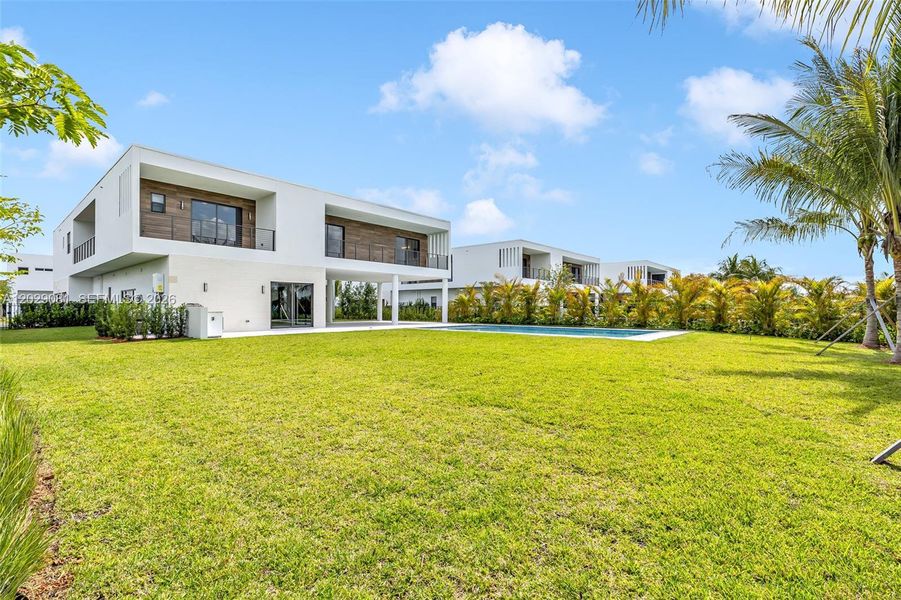 Exterior details and patio area of a home in , Weston (Image 40).
