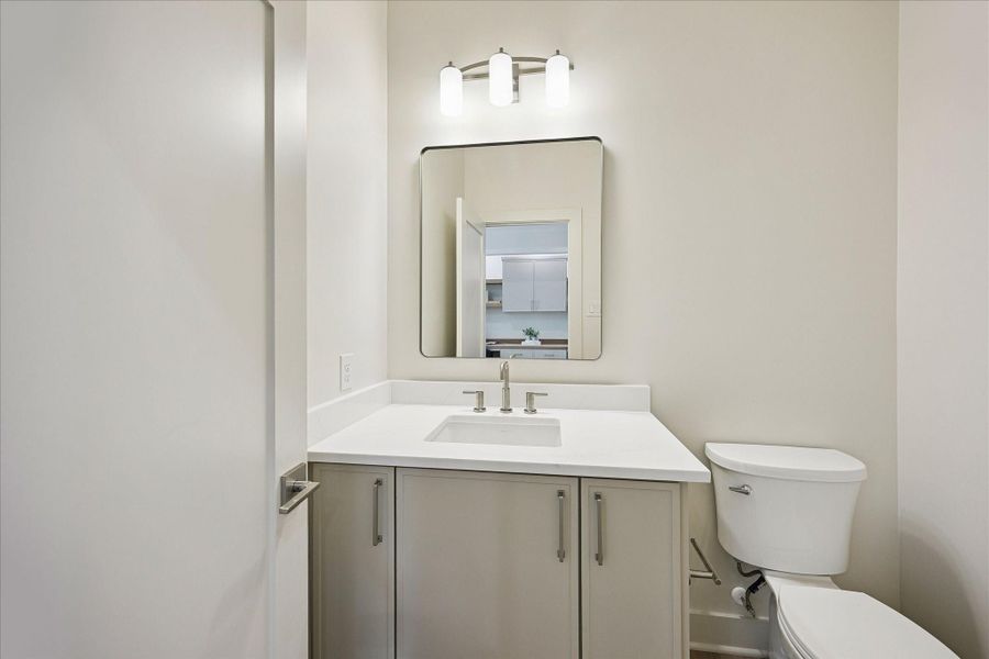 The upstairs powder bath is conveniently tucked near the game room. Upstairs also offers a Hollywood style bath and private full bath, while downstairs includes the owner’s ensuite, a full bath near the study or 5th bedroom and an additional powder bath.
