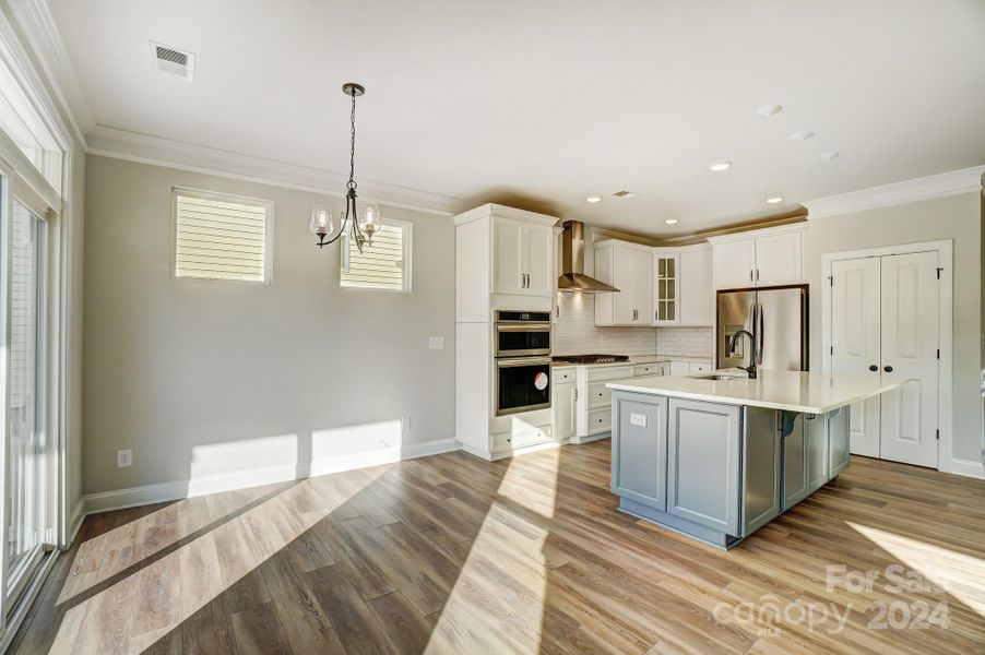 This home features all white cabinets and island