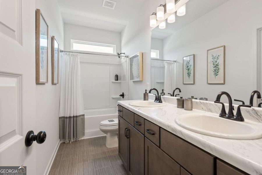 Furnished interior view inside a new home in Maddox Station, Eatonton (Image 18).
