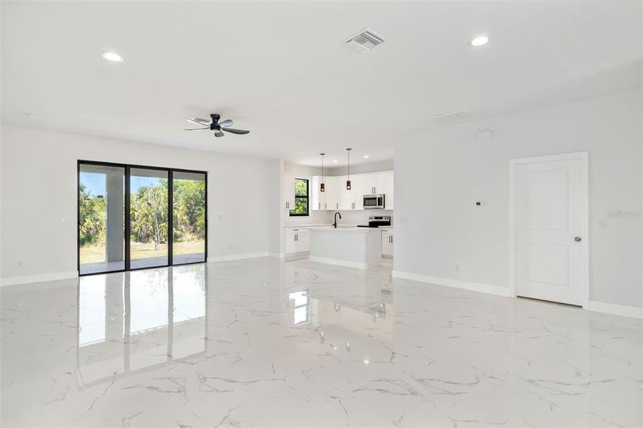 Spacious, unfurnished interior of a new home in , Port Charlotte (Image 42).