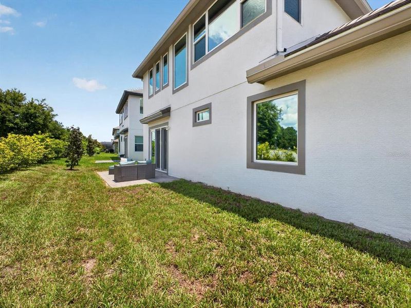 Exterior details and patio area of a home in , Davenport (Image 26).