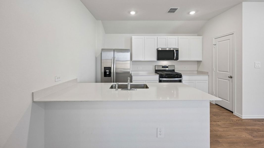 Furnished interior view inside a new home in Valverde, Bastrop (Image 6).