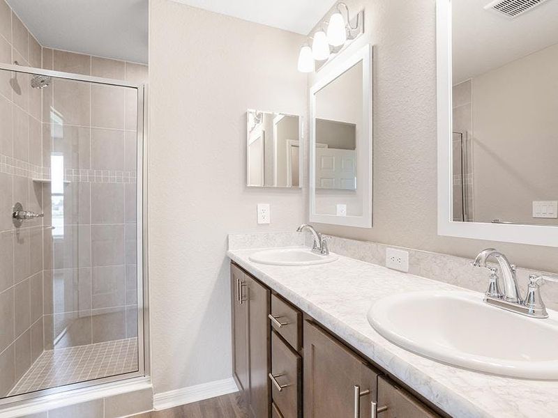 Your suite is complete with a large en-suite bath and a walk-in wardrobe - Bimini townhome by Highland Homes