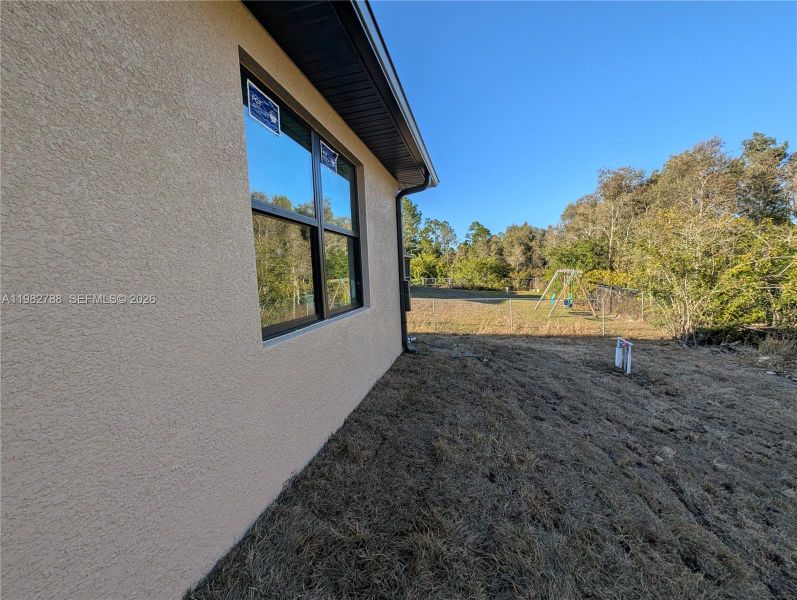 Exterior details and patio area of a home in , Lehigh Acres (Image 3).