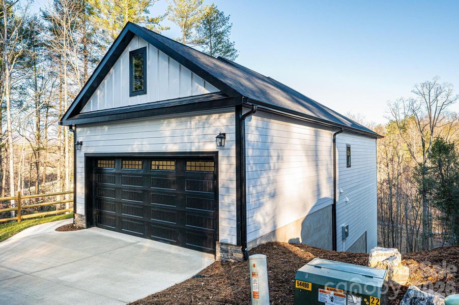 Front exterior of a new home in , Lenoir, NC, highlighting curb appeal (Image 19).
