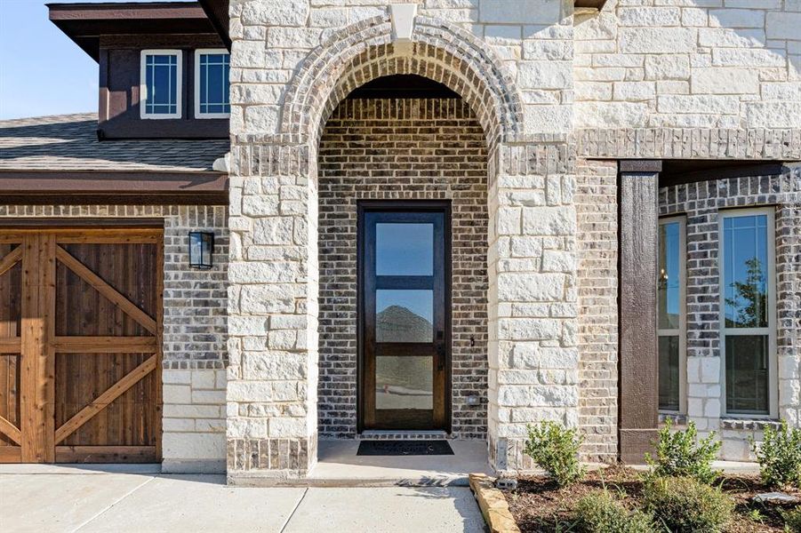 Exterior details and patio area of a home in The Retreat at North Grove 60, Waxahachie (Image 4). Exterior details and patio area of a home in The Retreat at North Grove 60, Waxahachie (Image 4).