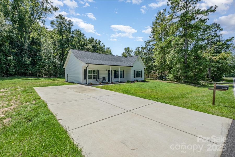Front exterior of a new home in , Pageland, SC, highlighting curb appeal (Image 24).