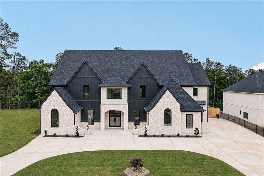 Front exterior of a new home in , Flowery Branch, GA, highlighting curb appeal (Image 2). Front exterior of a new home in , Flowery Branch, GA, highlighting curb appeal (Image 2).
