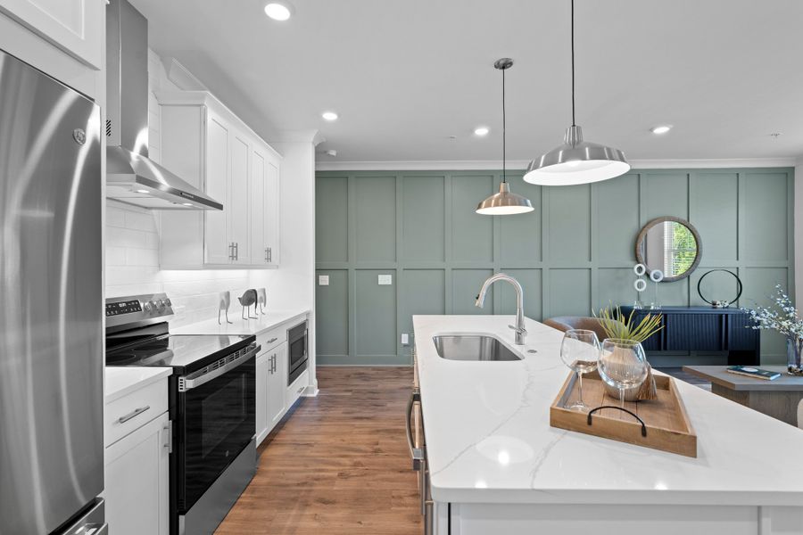 Representative furnished interior of a home built from the The Magnolia by The Providence Group in Market Square at Sawnee Village, Cumming (Image 11).