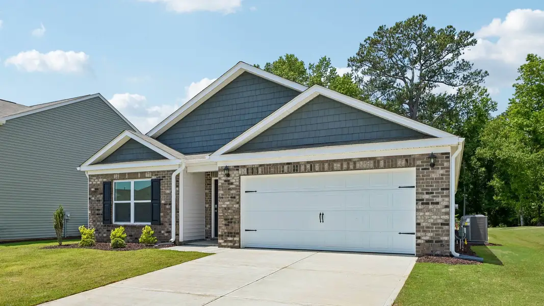 Representative exterior photo of a completed home built from the Cali by D.R. Horton in Belle Grove, Wendell, NC (Image 12). Representative exterior photo of a completed home built from the Cali by D.R. Horton in Belle Grove, Wendell, NC (Image 12).