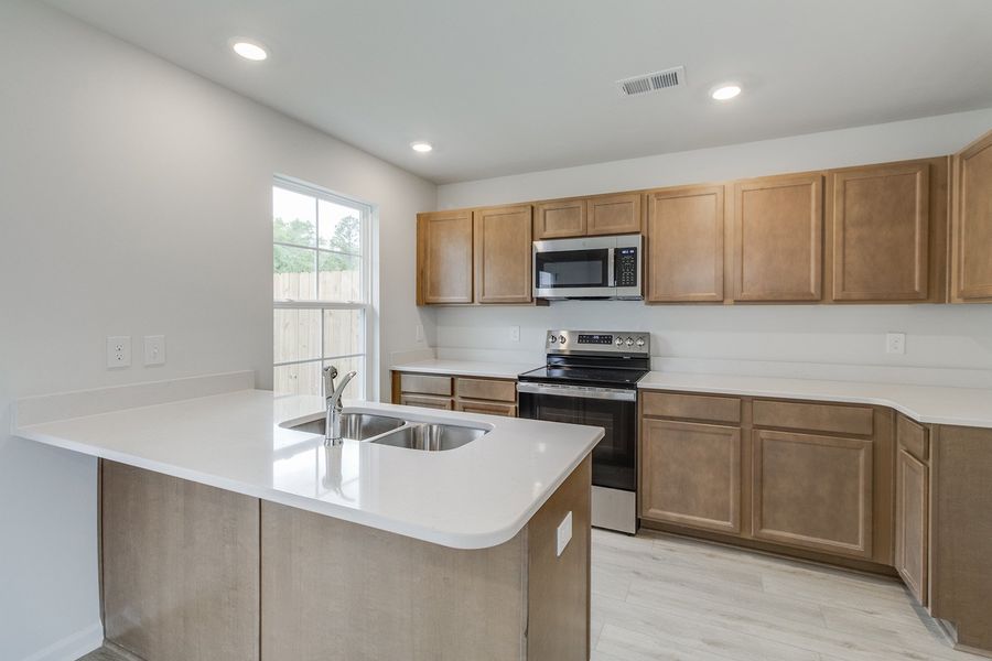 Furnished interior view inside a new home in Padgett Commons, Hopkins (Image 7).
